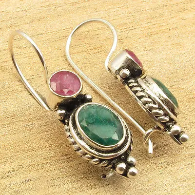 

Silver Overlay Collectible Red rubi & Green Emeralds Earrings 1 1/8