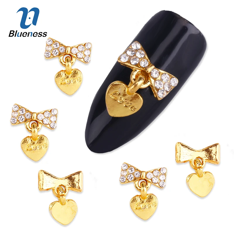 

Blueness 10pcs Glitter Golden 3d Bows Nail Art Decorations with Heart Rhinestones, Alloy Nail Charms Jewelry for Nail Tool TN980
