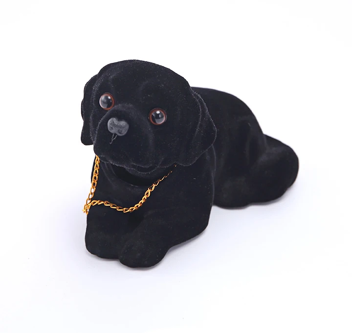 muñeco de perro que mueve la cabeza