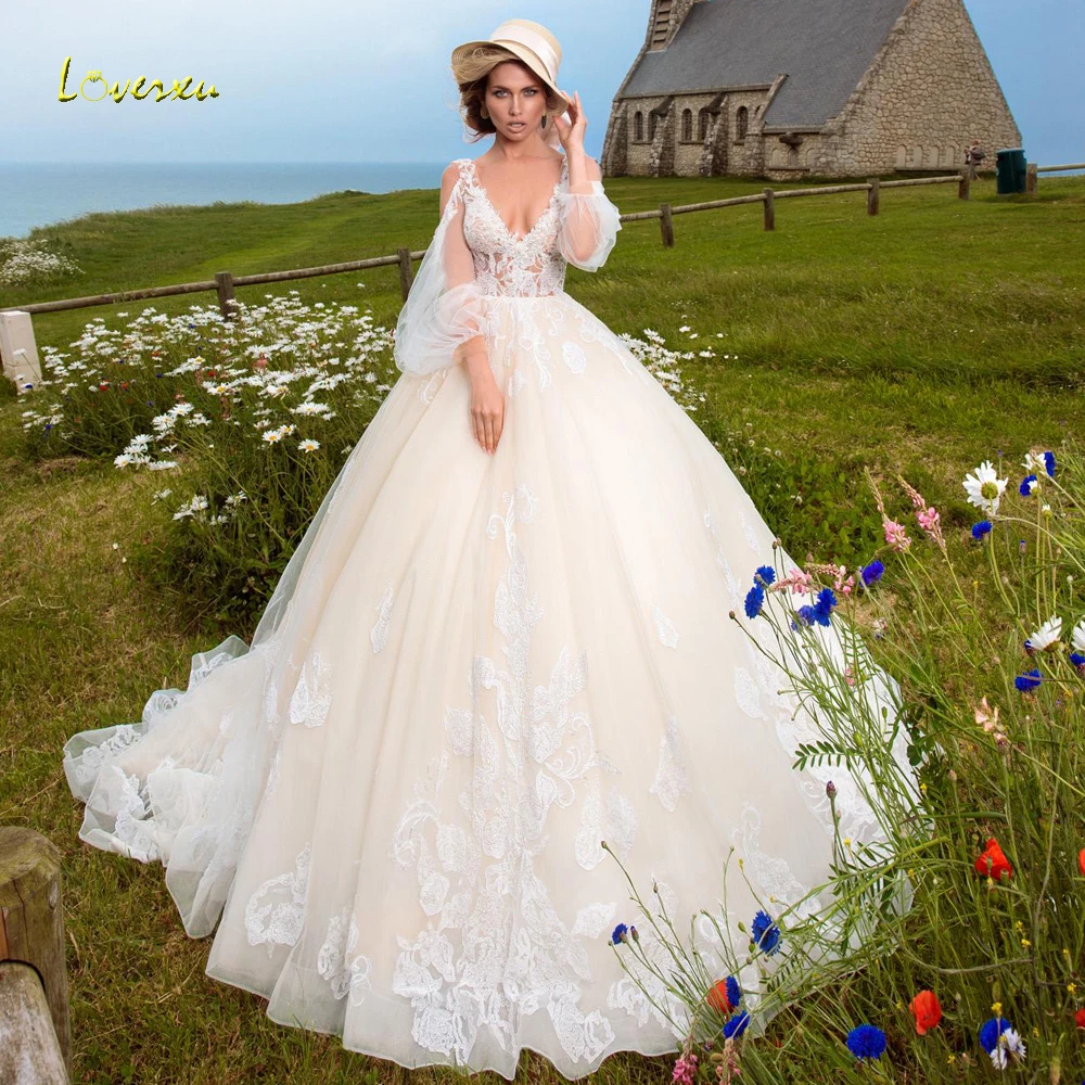 

Loverxu Sexy Backless Long Puff Sleeve Ball Gown Wedding Dresses 2019 V Neck Applique Beaded Court Train Vintage Bridal Gowns