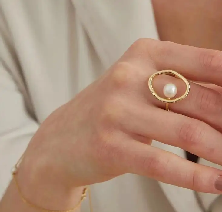 

Geometric metal hollow fashion temperament simple pearl ring rhinestone cross opening ring