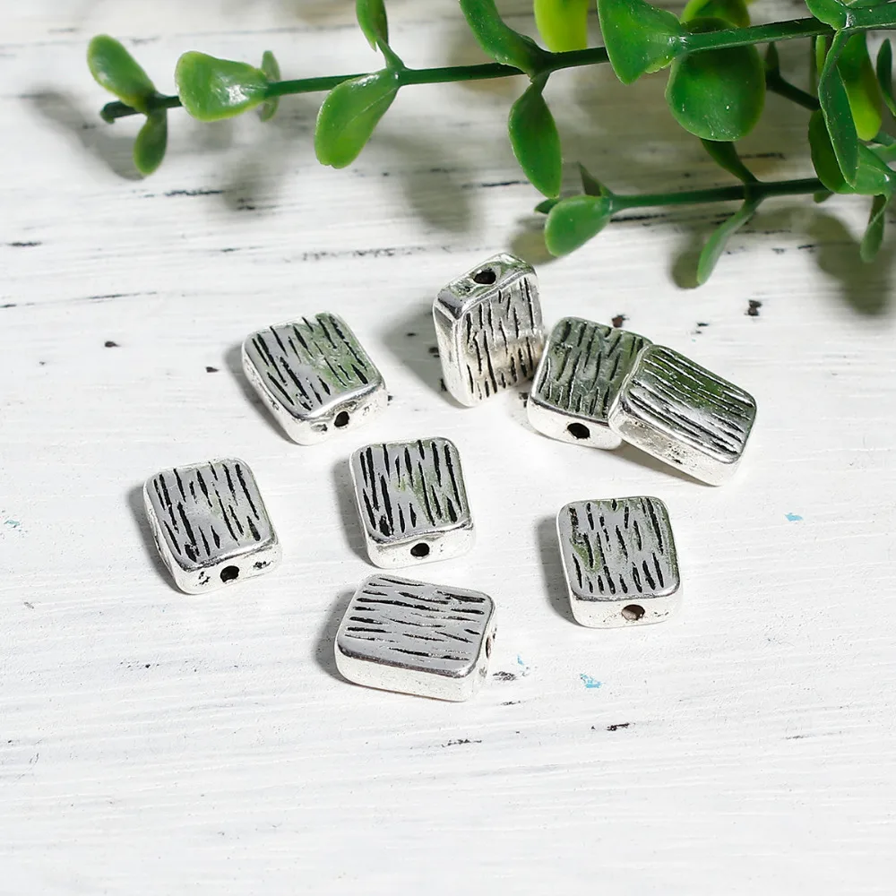 

DoreenBeads Zinc Based Alloy Antique Silver Spacer Beads Rectangle Stripe 12mm( 4/8") x 10mm( 3/8"), Hole: Approx 1.7mm, 10 PCs
