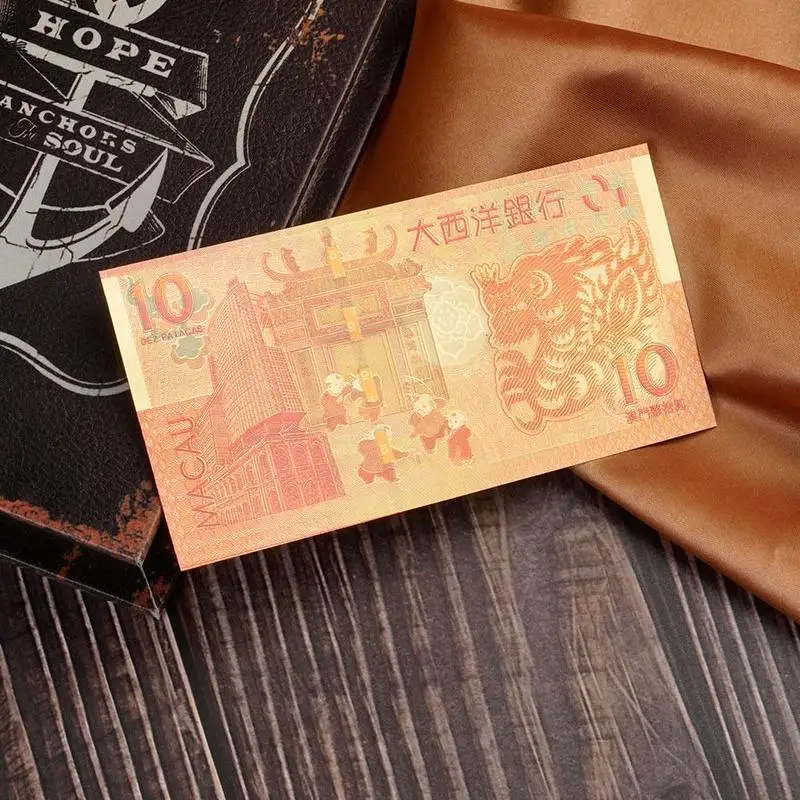 50pcs Macao 10 yuan Atlantic Banknotes Crafts golden plastic Foil paper money