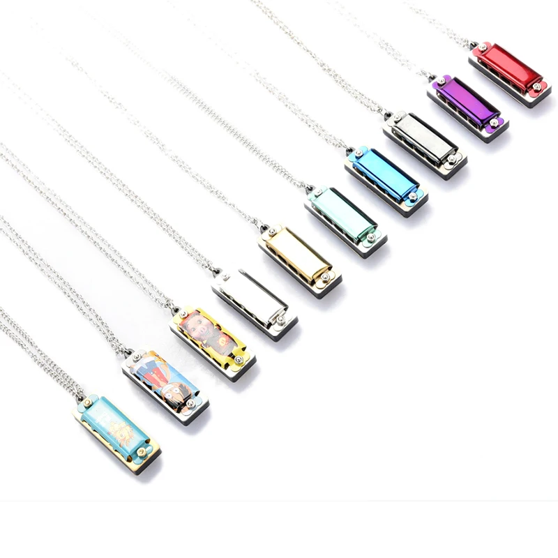 Mini 4 Hole 8 Tone Harmonica Portable instrument Decorative Metal Necklace Design Chain Toy Gift Color Random Simple piano