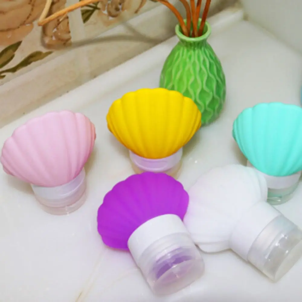 

Professional Portable Travel Cosmetic Bottle Points Shell Shape Toiletries Bottle For Shampoo Shower Travel Gel Bottle Storage