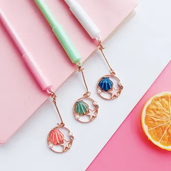 

24 pcs/Lot Mini Shell gel pen Pearl Starfish pendant Black color ink pens writing gift Stationery Office school supplies F613