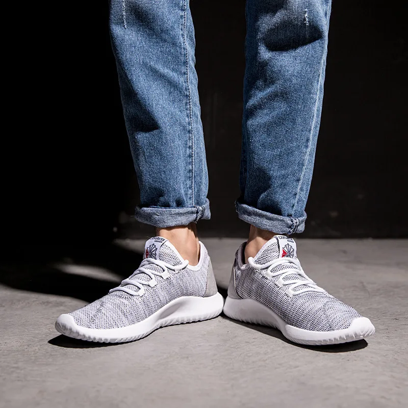 

Large size flying woven lightweight casual running shoes trend breathable Korean version of wear-resistant new sports shoes