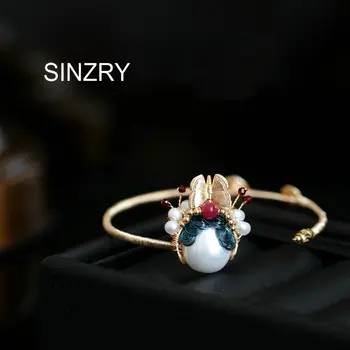 

SINZRY gold color handmade pearl wire winding peking facial mask personality charm cuff bangles lady jewelry accessory