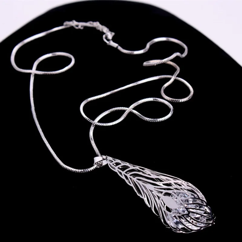 

new fashion Crystal hollow leaf sweater chain long necklace Female ornament accessories wild sweater chain pendant necklace