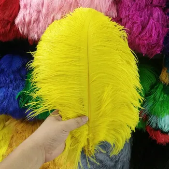 

Hot 100PCS pretty 30-35cm/12-14 inches high quality yellow ostrich feather Plume wedding decoration craft /DIY accessories