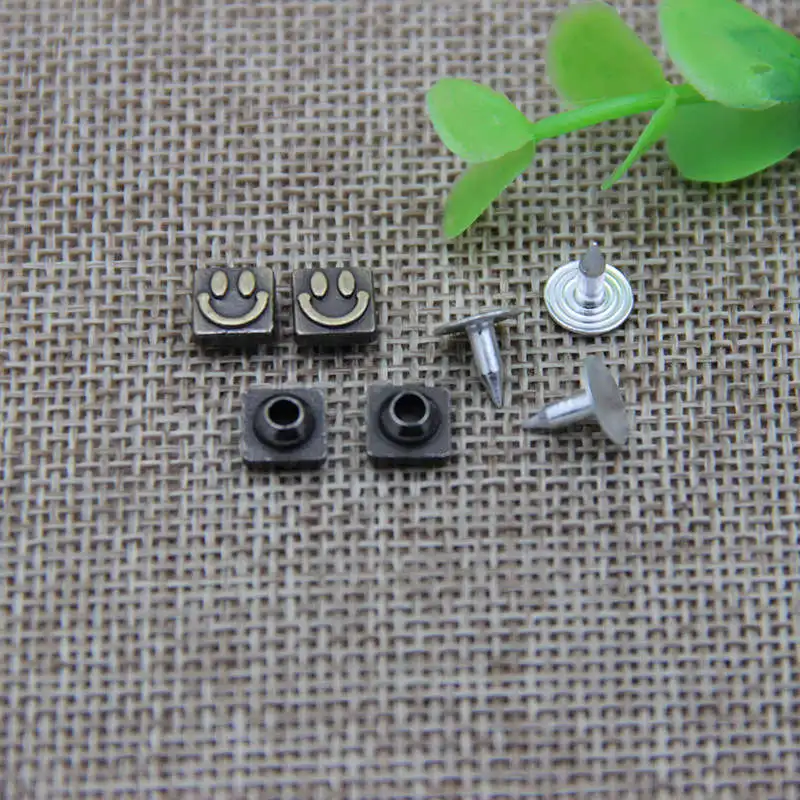 

DoreenBeads Metal Alloy Garment Rivets Square Smile Expression Antique Bronze Costume Clothes Jeans Decorative Rivet 100Sets