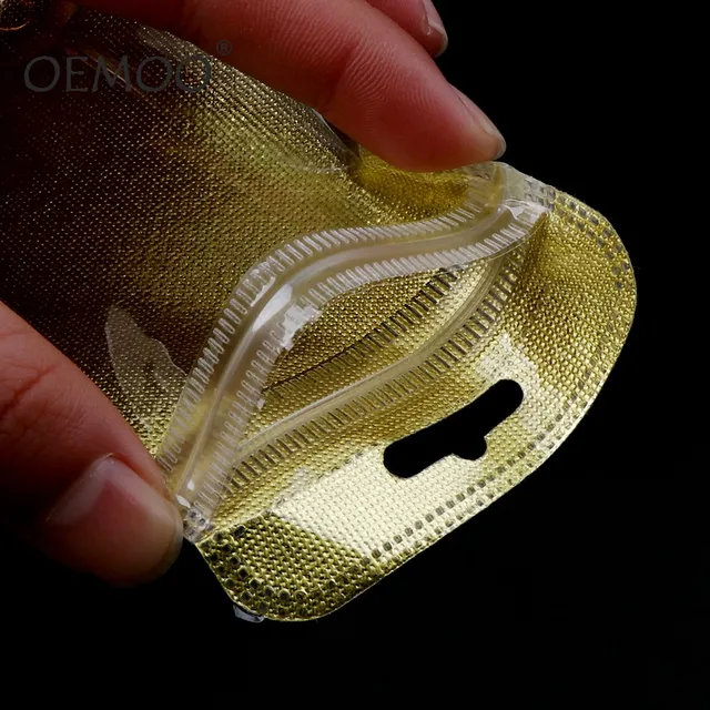 100pcs Gold Silver Plastic Non-woven 7.5*11cm Fabric Zip Lock Self-Sealing Bag USB Cable Jewelry Packaging Storage Pouches