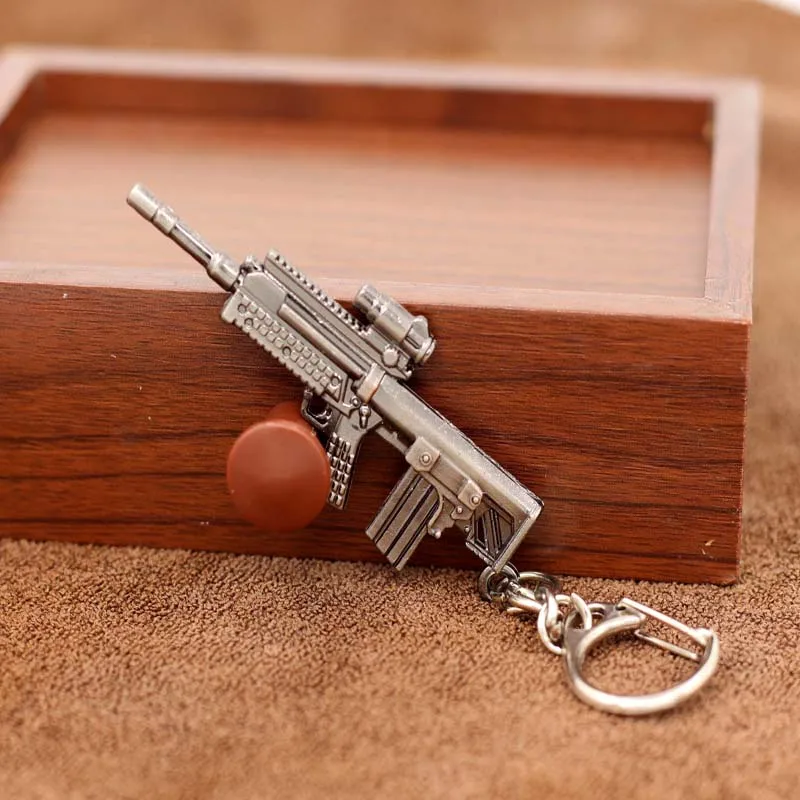 

Military souvenirs Assault Rifle FAMAS Metal Model Keychain Black Gun Plated Alloy Pendant Rifle Key Chain Ring Men Jewelry Gift