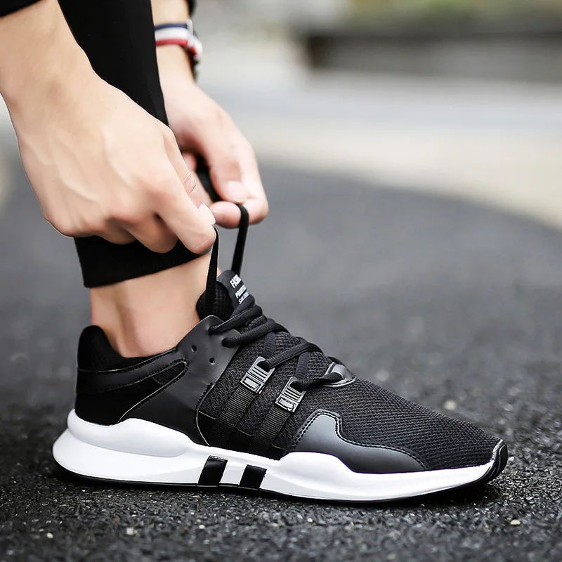 

2019 new spring and autumn men's sneakers casual running shoes trend breathable color matching soft bottom wild men's shoes