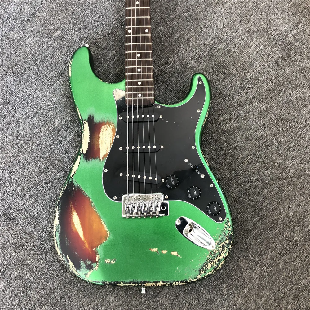 

Kaiyun factory custom handmade copy of old SRV ST electric guitars.100% handmade. Beautiful metal green multicolor guitars