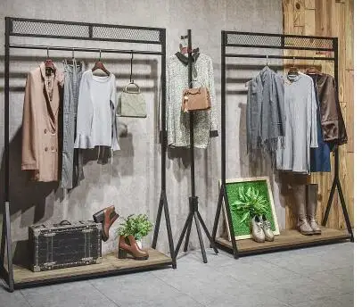 Clothing store display rack. floor-to-floor. vintage iron clothing rack women's clothing store combination shelf island rack.