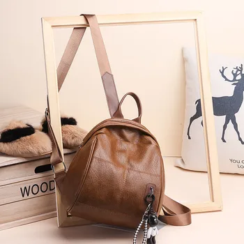 

New Ladies Backpack Europe and The United States Popular New Backpack Fashion Pendant Bear Waterproof Ladies Bag