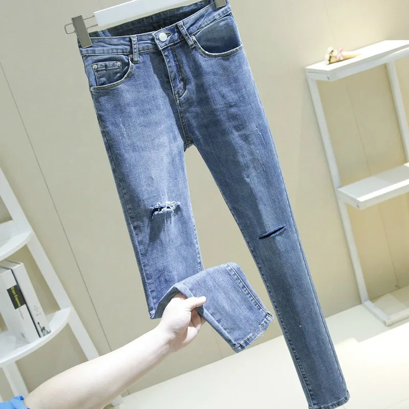 Новые модные весенние узкие джинсовые женские джинсы карандаш Эластичный Высокая талия мотобрюки рваные синий стрейч промывают джинсы