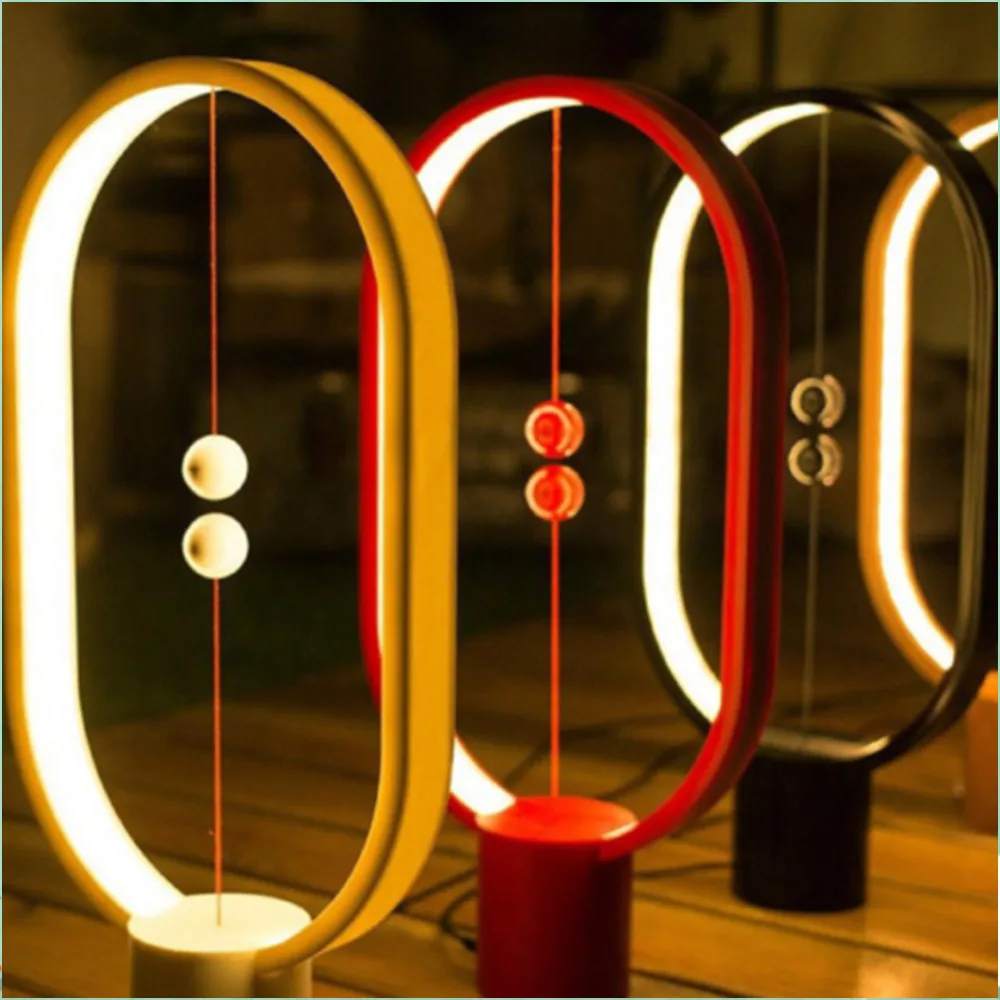 

Dropshipping DC36V 5W 48LED Heng Balance LED Table Lamp Ellipse Magnetic Mid-air Switch USB Powered Warm White Night Light Lamp