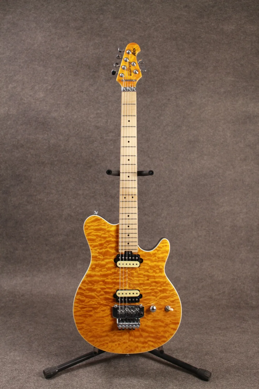 

Ernie Ball Music man AXis eletric guitar AAAAA grade quilted maple top floyd rose bridge