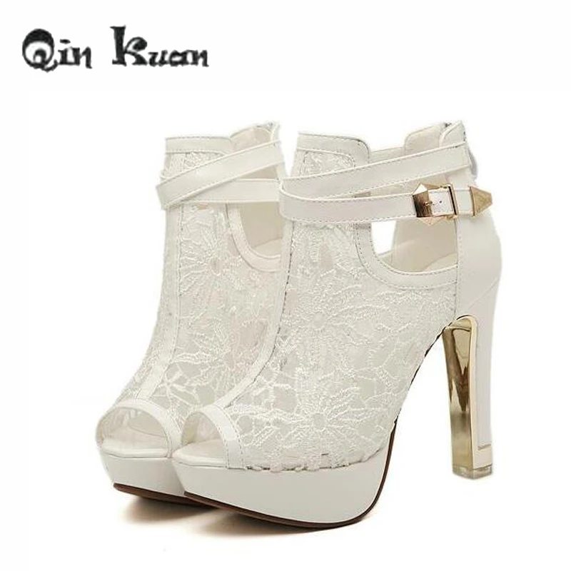 white pumps with flowers