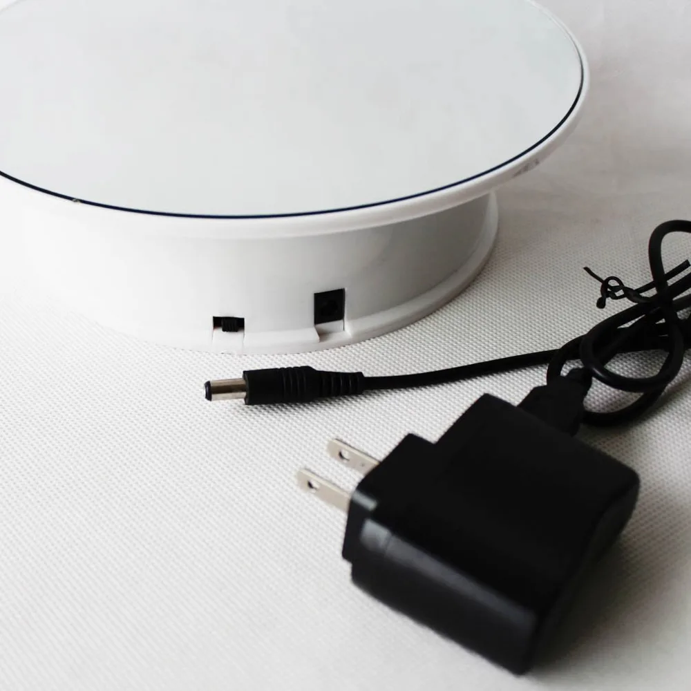 Wholesale Free Shipping Battery And AC Adapter Powered Rotating Display Stand For Camera Ipad