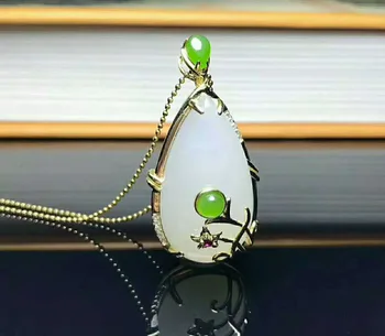 

Xinjiang Hotan Jade White jade pendant color gold drilling color diamond jasper inlaid white jade drop pendant Pendants