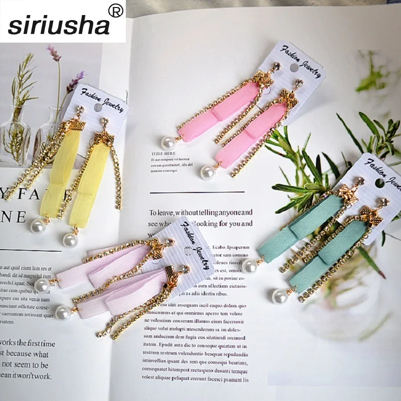 

Wholesale Spring New Earrings Cloth Exaggerated Sweet Long Clean Fresh Personality Ribbon Earrings Tassel Girl S169