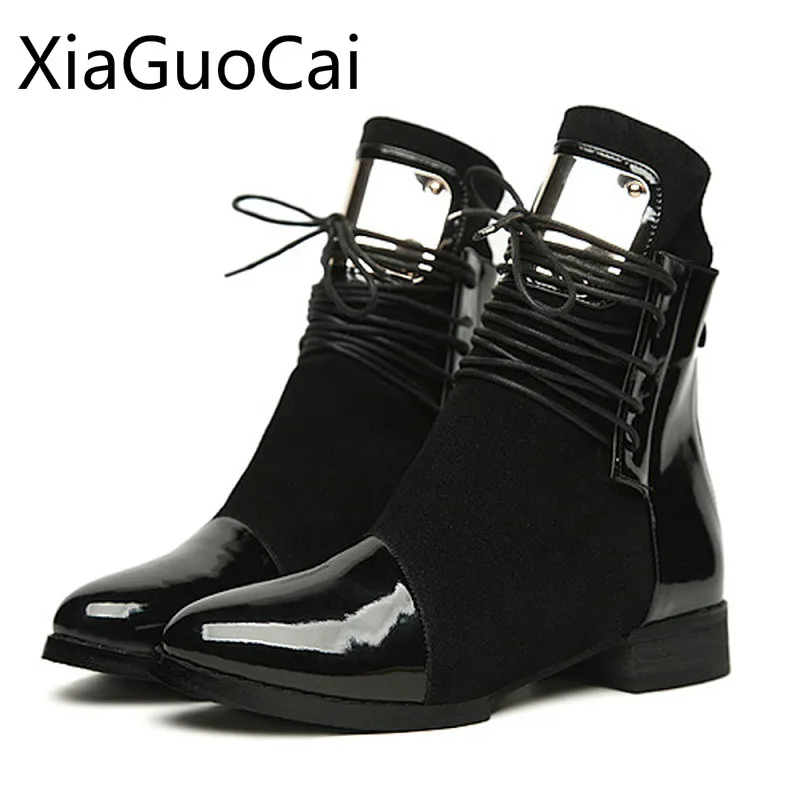 patent flat ankle boots