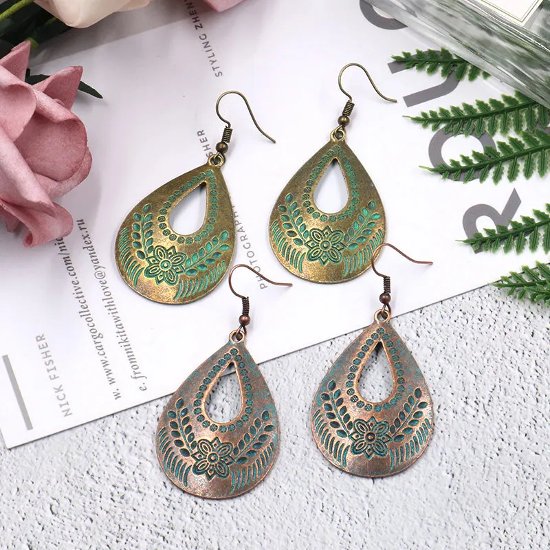 

New retro exaggerated geometric oval water drop engraving pattern old bohemian bronze red copper old alloy woman earrings