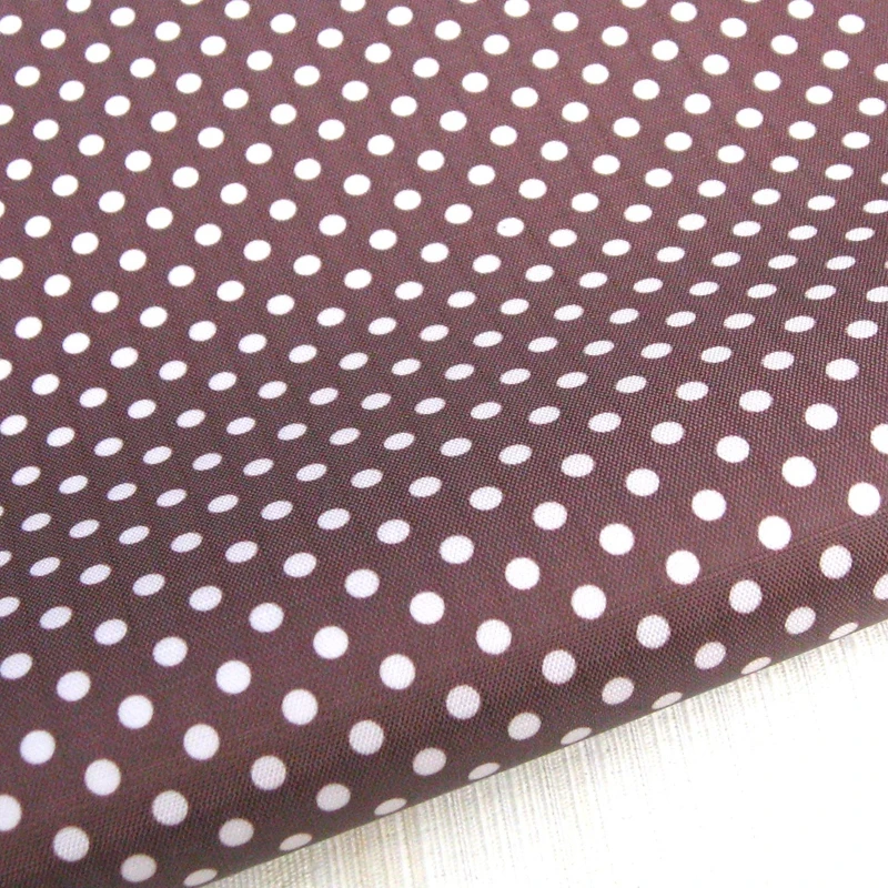 

WF118 - PVC coated waterproof fabric - polka dot on coffee