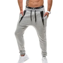 Популярные мужские модные повседневные брюки; эксклюзивные лоскутные брюки с цепочкой