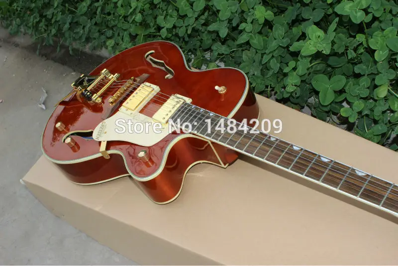 

Vicers 2014 New orange F-hole hollow body Jazz Electric guitar with gold burst pick guard in stock