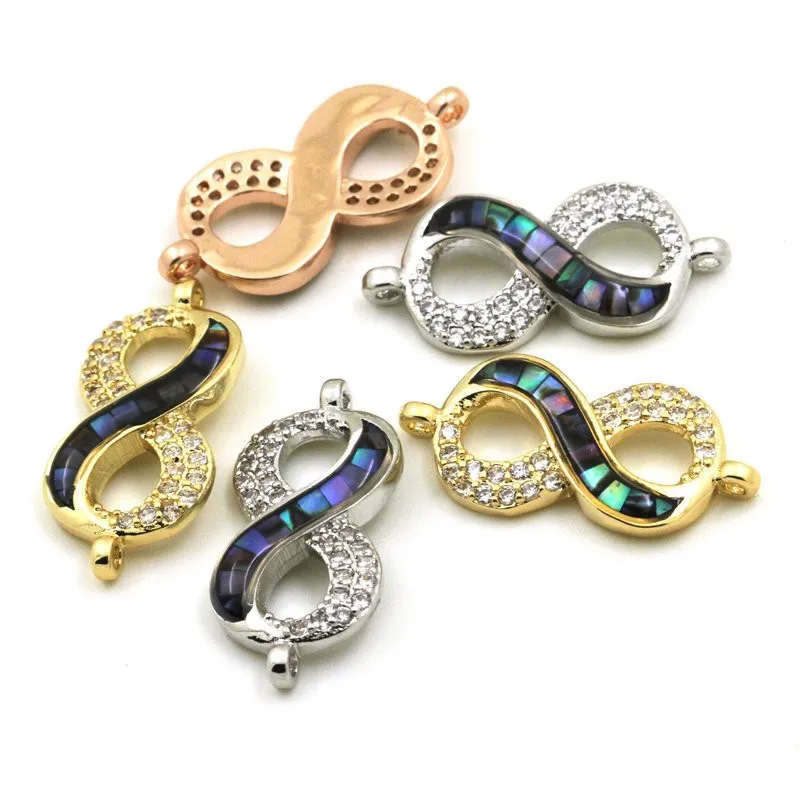 

Eternity connector, with white abalone shell chips, clear cubic zirconia CZ micro pave, space connector
