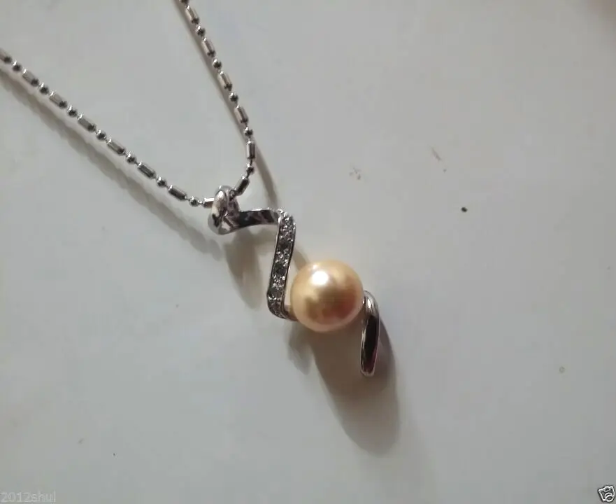 

Free shipping >>>>>>Graceful 10mm round Yellow shell pearl S-Shape pendant necklace 18