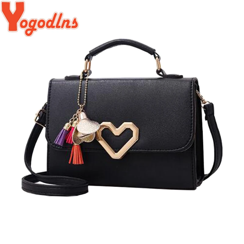 Yogodlns 2019 النساء حقائب أسلوب بسيط الأزياء رفرف حقيبة حقيبة مزيّنة بشريط جلدي القلب غلق بمشبك الكتف Crossbody أكياس حمل