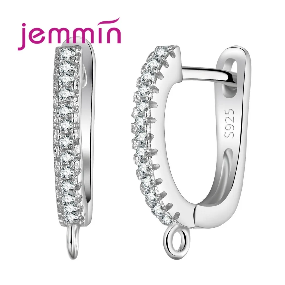 

Серьги-кольца из серебра 925 пробы с прозрачными кристаллами