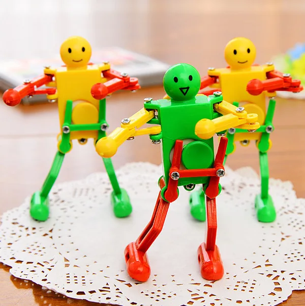 2PCS/lot Clockwork Spring Wind Up Toy Dancing Robot Toy for Children Kids Toy HK