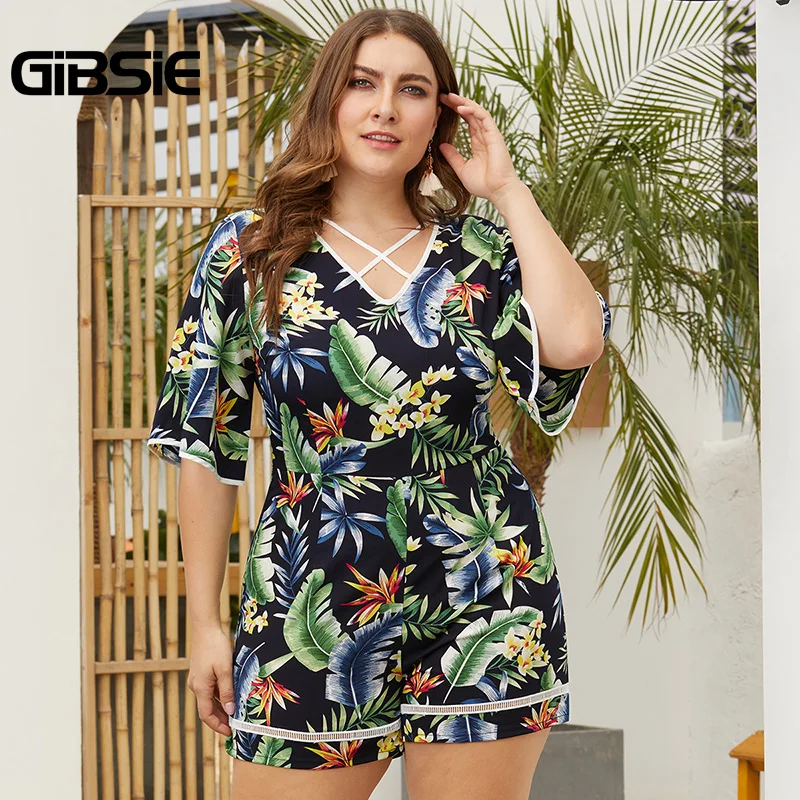

GIBSIE Plus Size Tropical Print Crisscross V-Neck Romper Women Summer Vacation Casual High Waist Half Sleeve Beach Playsuit