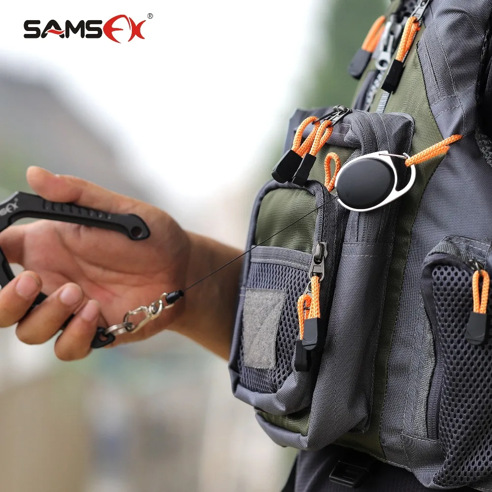 SAMSFX Fishing Zingers Retractor with 360 rotated clips Angler wearing fly vest show