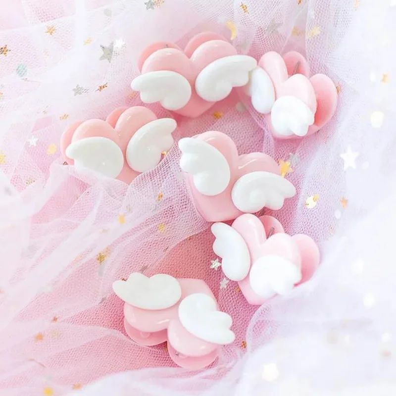 

5 Pcs hot Novelty Heart Shape with wings Pink Clips Mini Plastic Binder Clips Notes Letter Paper Clip Office Supplies