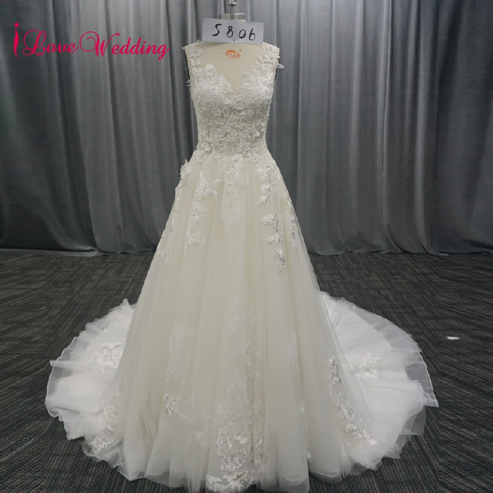 

Vestido De Novia Wedding Gowns 2019 Lace Applique Beaded A Line Sheer Jewel Collar Court Train Boho Luxury Wedding Dresses