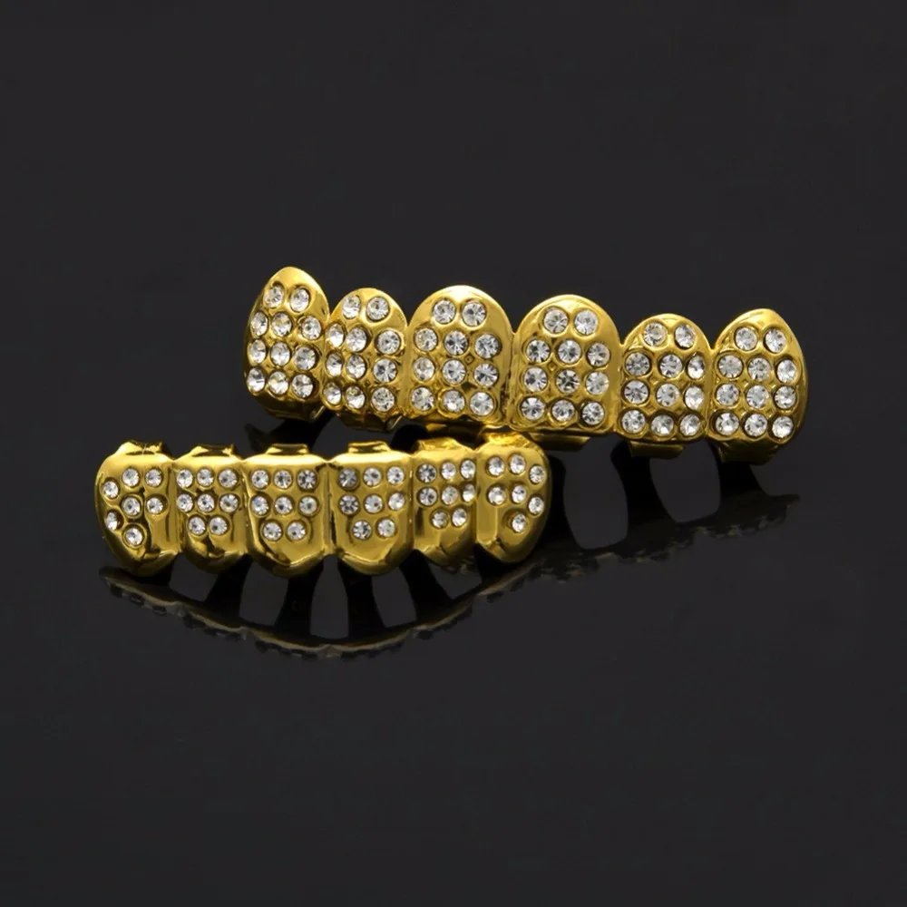 

Fashion Copper Rhinestone Hip Hop Teeth Grillz Top & Bottom Grillz Set with Silicone Vampire for Party Gift Golden Silver