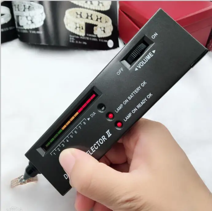 herramientas joyeria Hot mini light diamond detector/tester , real