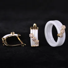 Blucome Nuevo Sistemas de la Joyería de Aretes y Anillo Blanco De Cerámica Brinco Bijoux de Oro Princesa Flor Gancho de Cobre Del Rhinestone Bijouterie Anel