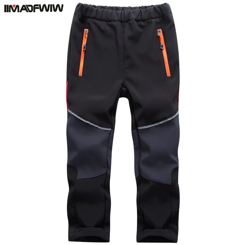 Online 2018 Otoño Invierno niños niñas pantalones de senderismo exterior Softshell pantalones impermeable a prueba de viento térmico para Camping esquí escalada