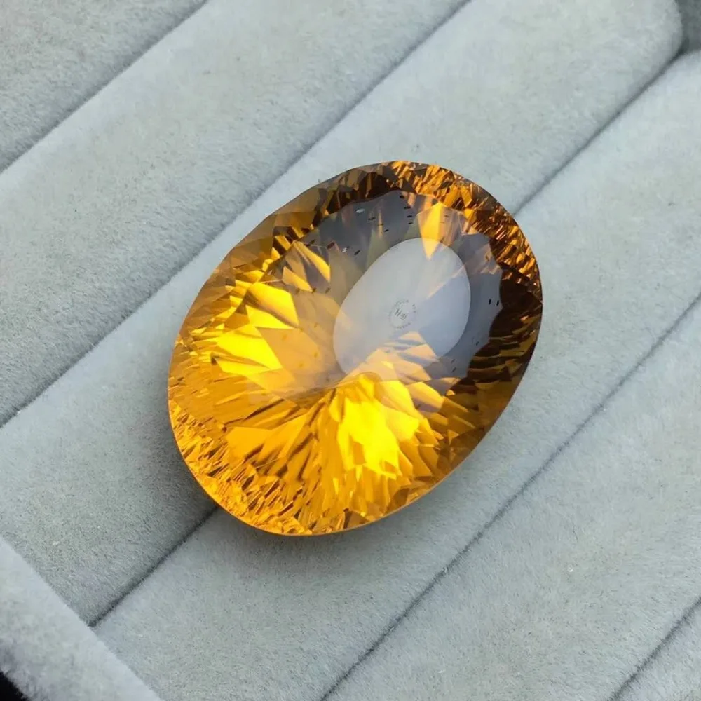 

natural Citrine,Bright color,Weight: 50.4ct,Specifications: 26.8 x 20.5 x 16mm,Perfect gemstone perfect quality