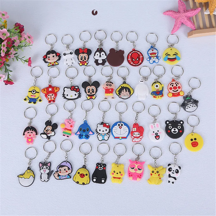 

Sales 100PCS/Lot Mixed Styles Personalized Creative Cute Cartoo PVC Soft Plastic Key Chain Hang Decoration Gift Key KC20