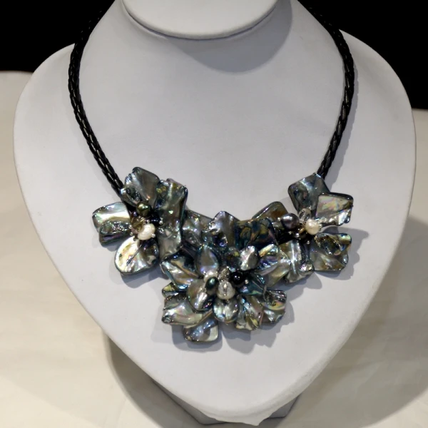 

Black mother of pearl shell flower necklace with leather chain