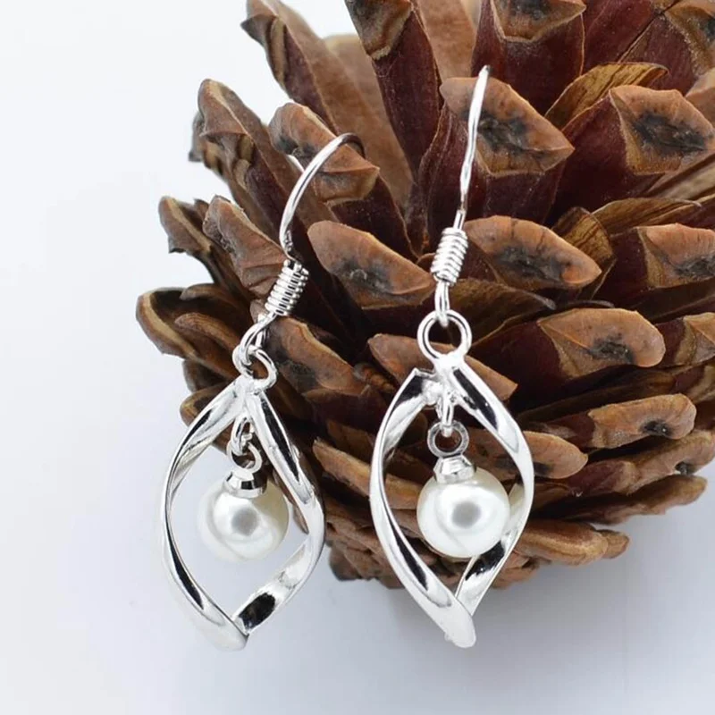 

New Rotating Love Tassel Earrings Temperament Girl Reversing Pearl Earring Simple Female Student Long Style Earrings